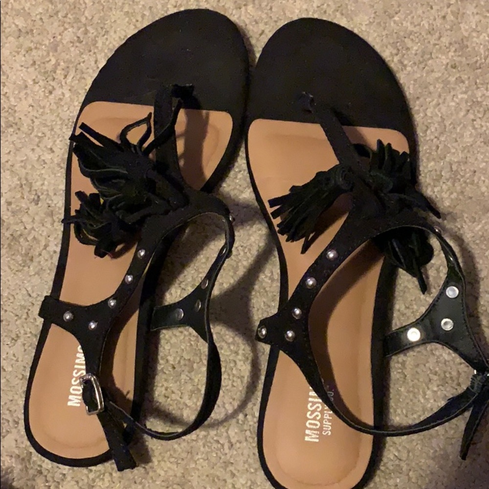 Black sandals with tassels